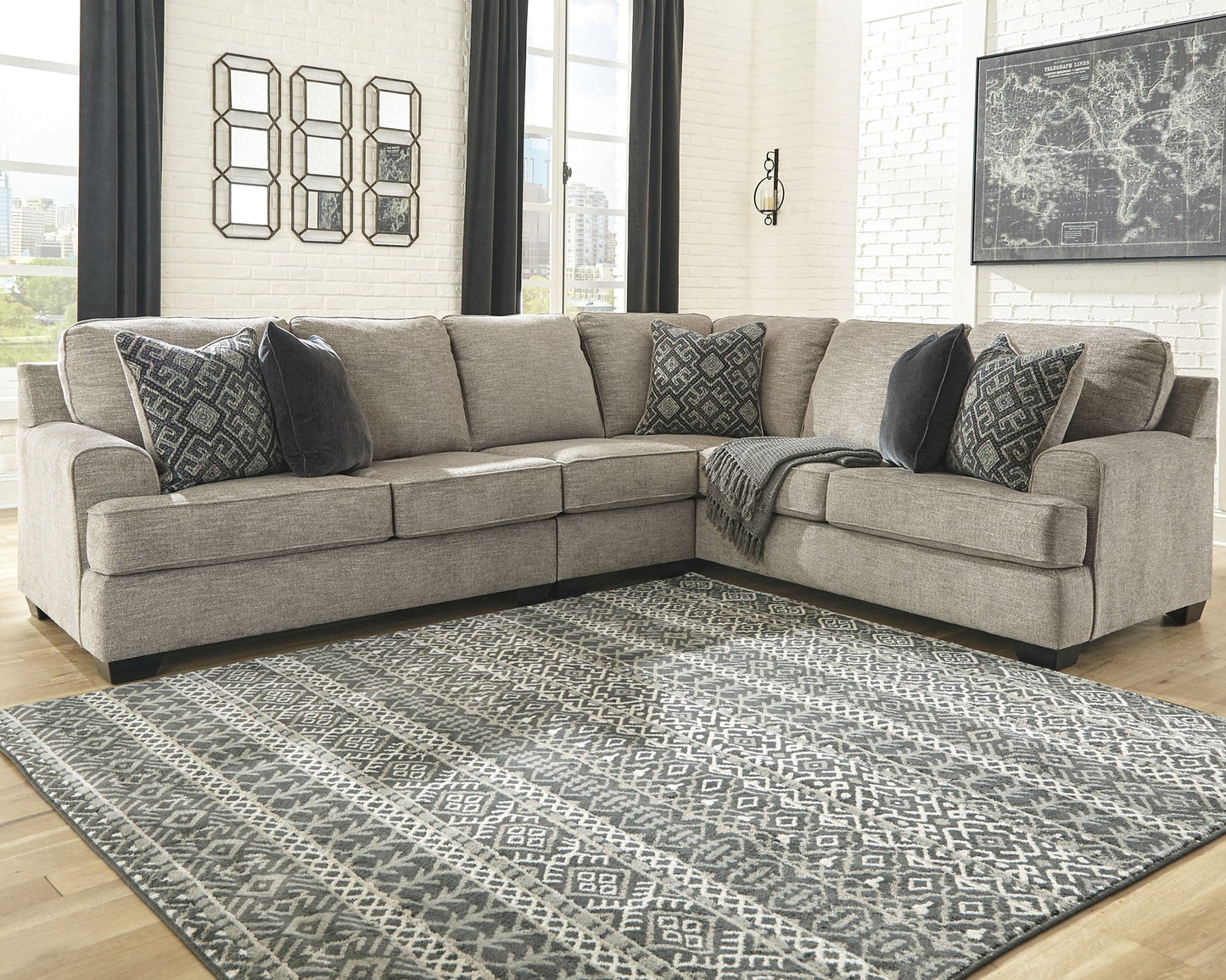 Bovarian 3-Piece Sectional with Ottoman Rent Wise Rent To Own Jacksonville, Florida