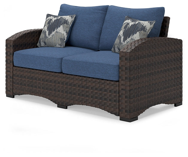 Windglow Outdoor Loveseat and 2 Chairs with Coffee Table