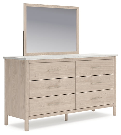 Cadmori  Upholstered Panel Bed With Mirrored Dresser