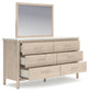 Cadmori  Upholstered Panel Bed With Mirrored Dresser