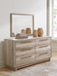 Hasbrick  Panel Bed With Mirrored Dresser And 2 Nightstands