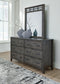 Montillan  Panel Bed With Mirrored Dresser And Nightstand